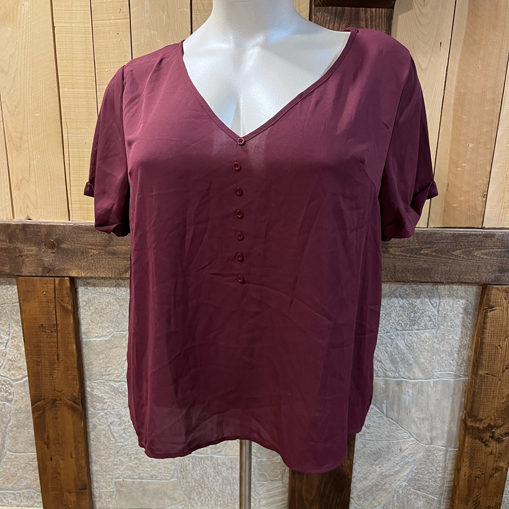 - Burgundy blouse